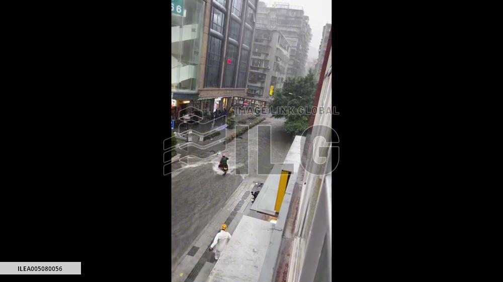 China: Delivery Riders Rush to Save Boy Swept Away by Floodwaters in Guangzhou