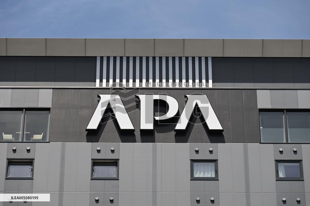 APA Hotel signboard and logo