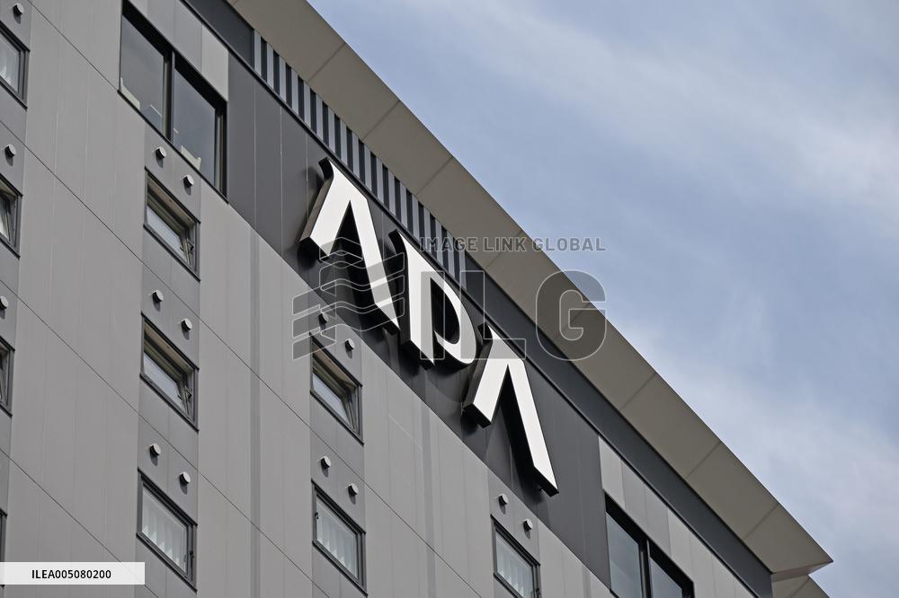 APA Hotel signboard and logo