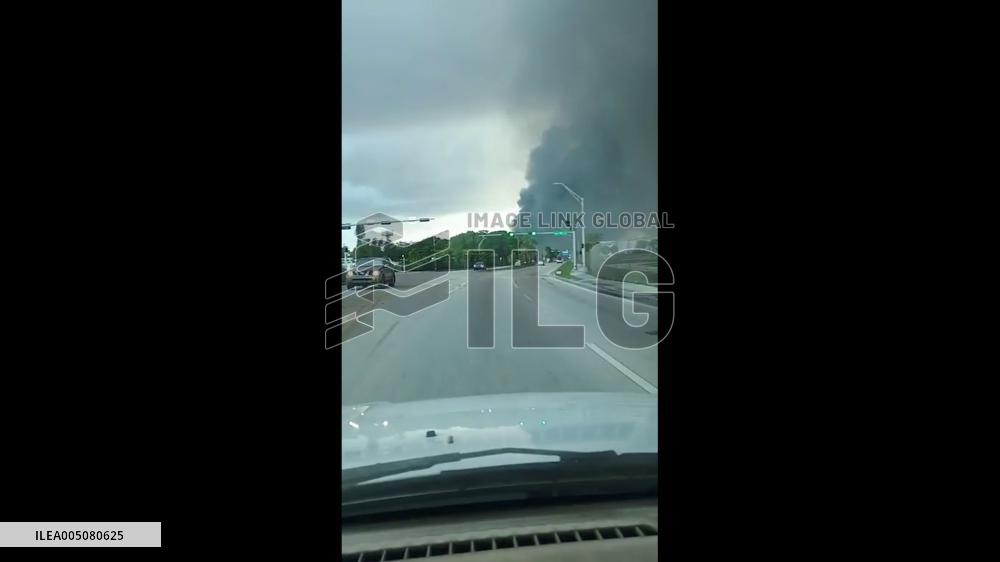 US: Six-Alarm Junkyard Fire Sends Massive Smoke Plume Over Opa-locka, Miami