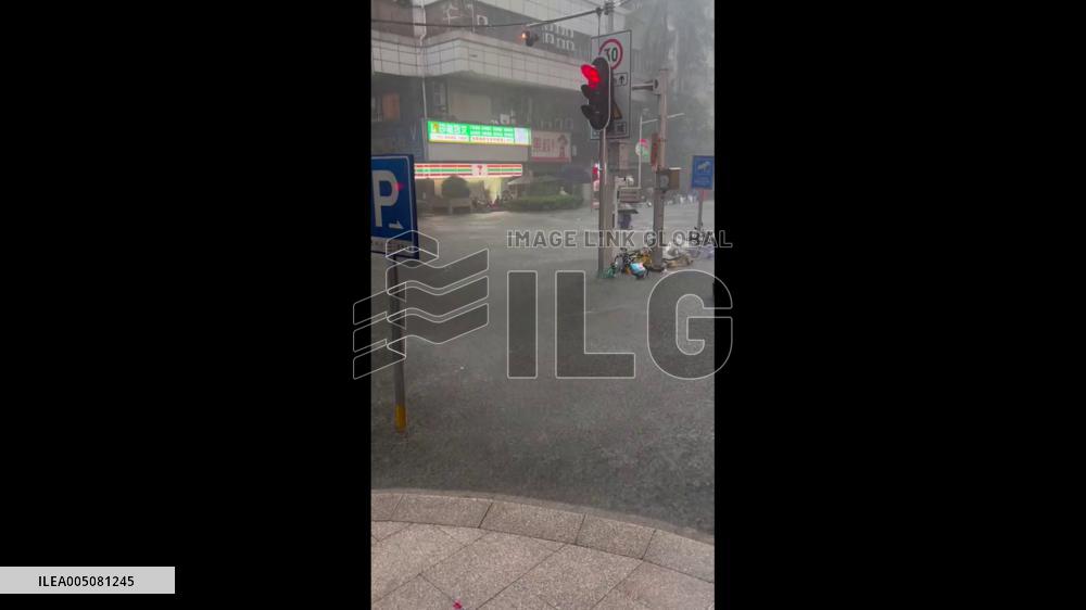 China: E-Scooter Glides Through Waist-Deep Floodwater on Submerged Guangzhou Road