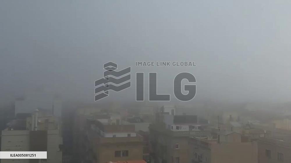 Spain: Thick Fog Shrouds Barcelona Beach in Late May