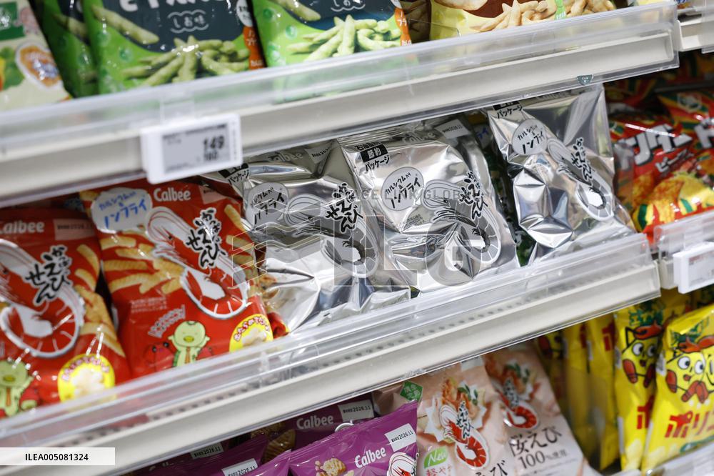 Black-and-white Calbee snack packages