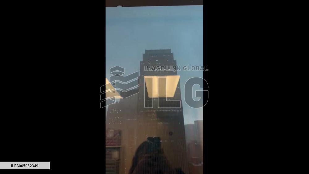 US: Flying Debris Caught on Camera in Downtown Chicago During Storm