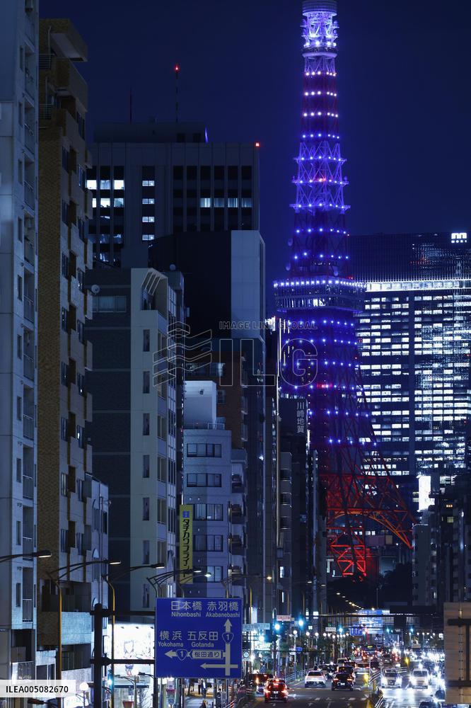 Tokyo Tower lit up in blue