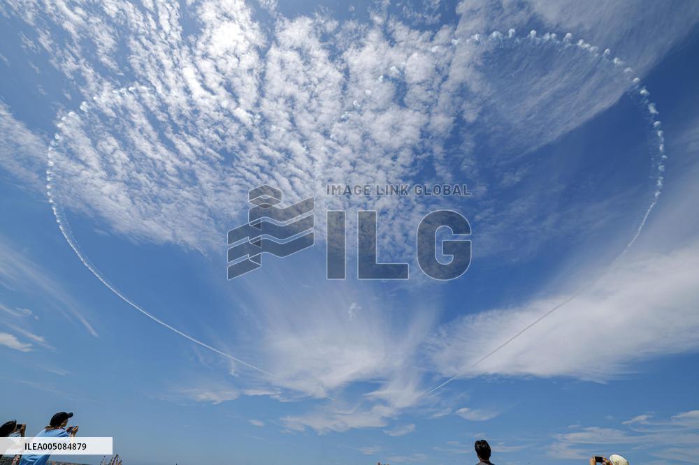 Blue Impulse aerobatic team flies over quake-hit Wajima