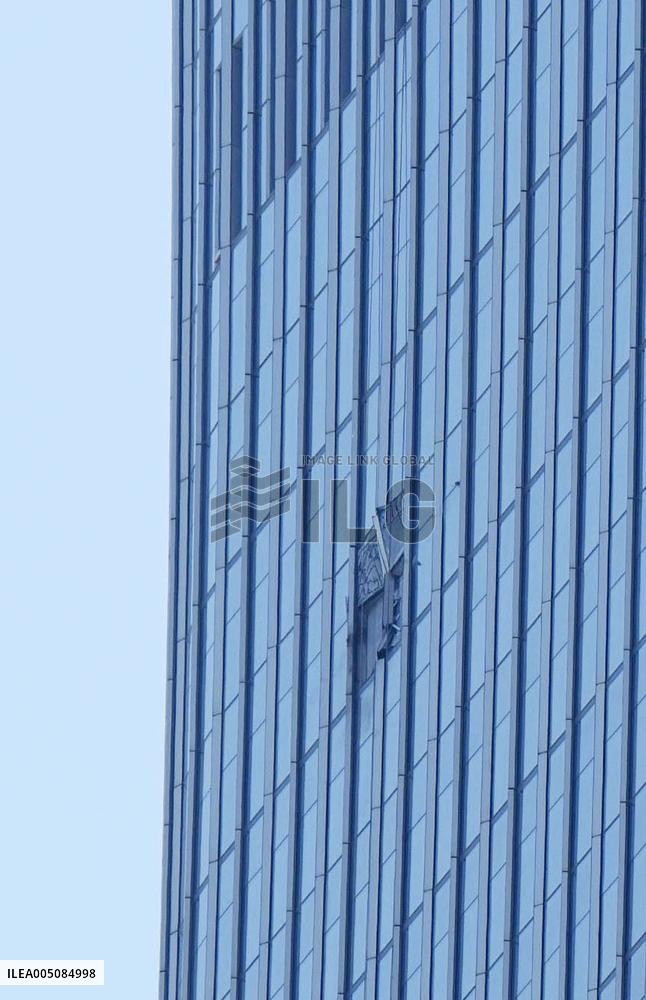 Light aircraft crashes into skyscraper in Beijing