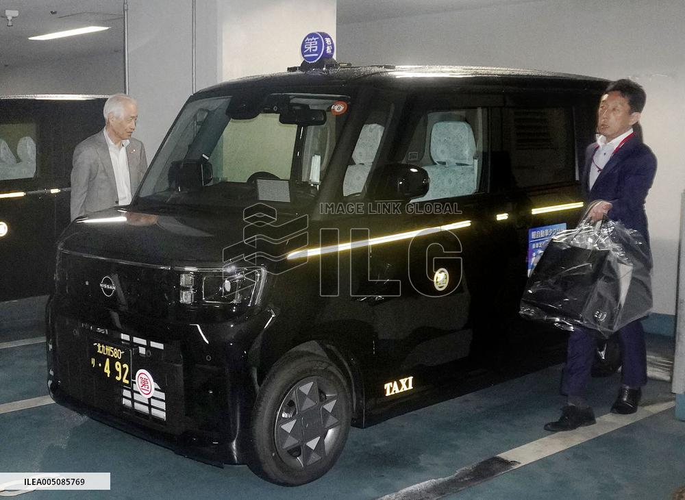 Japan's first gas-powered mini taxi