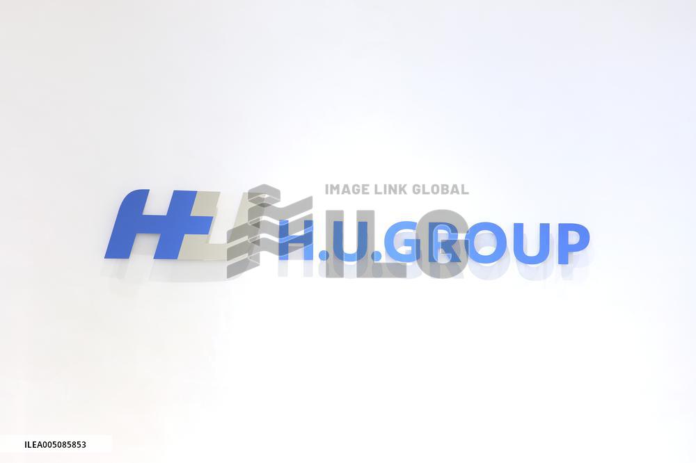 H.U. Group Holding Sign and Logo