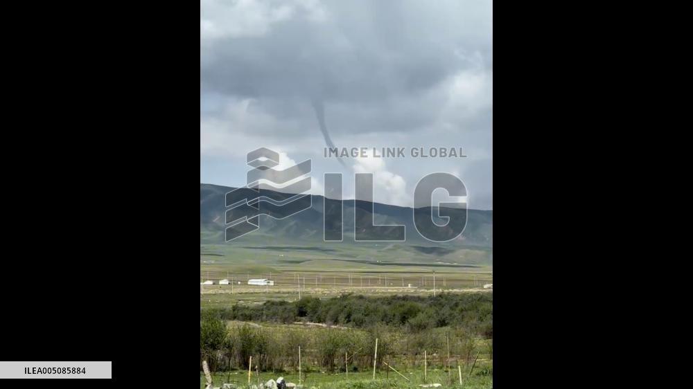 China: Waterspout Forms Over Qinghai Lake in Haibei Prefecture