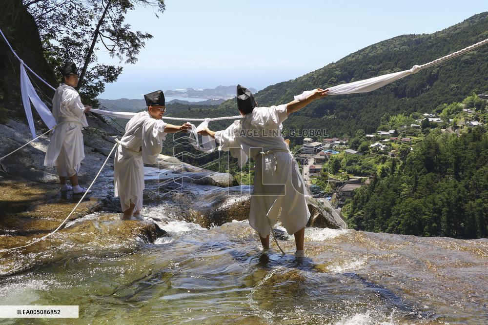 Sacred rope exchange at Nachi Falls