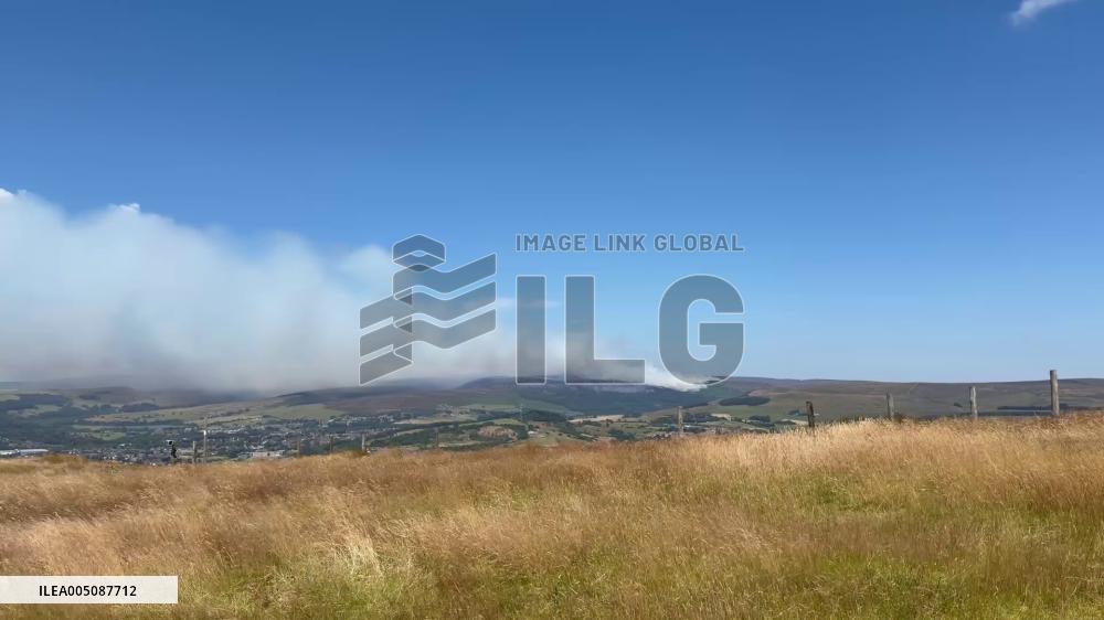 UK: Major Wildfire Burns Across Dovestone Reservoir Moorland