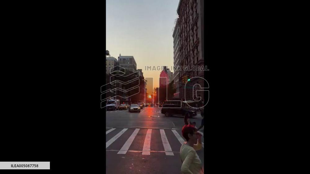 US: New Yorkers Gather for Last Manhattanhenge Sunset of the Year