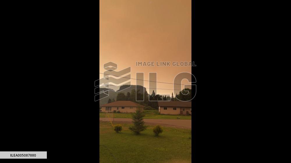 Canada: Wildfire Smoke Blankets Ontario Skies in Orange Haze 2