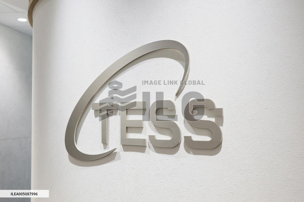 Tess Holdings Sign and Logo