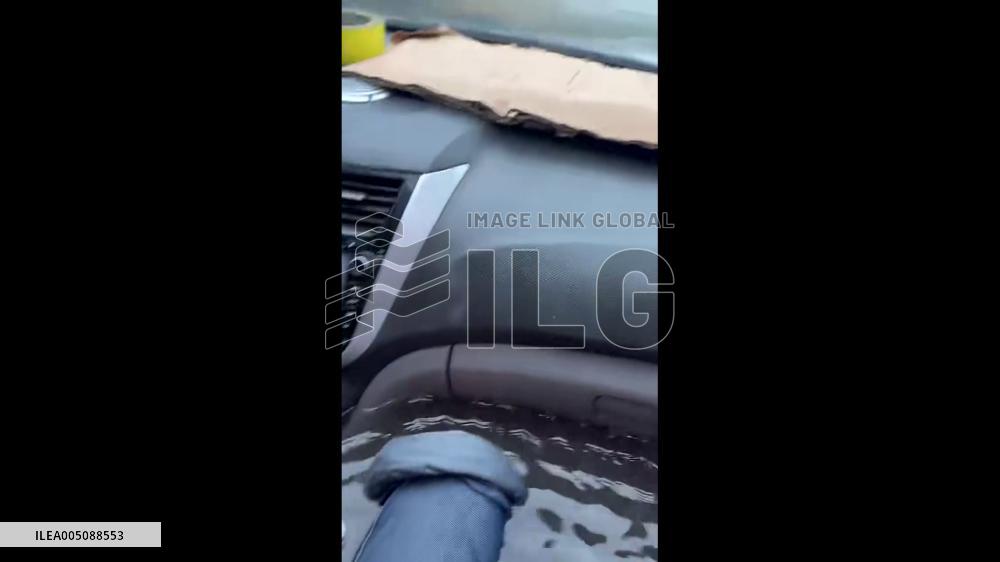 China: Floodwater Fills Car Interior Amid Downpour in Shenyang
