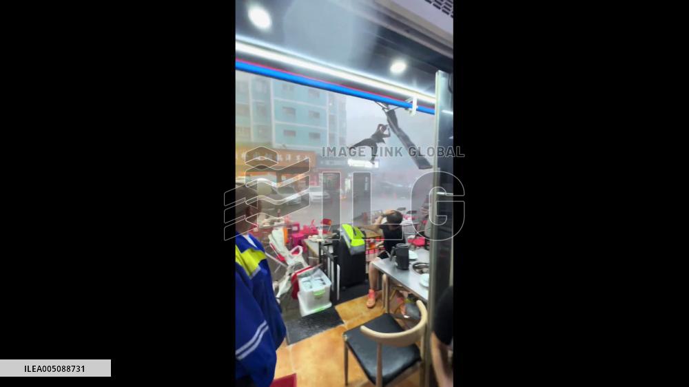China: Man Blown Into Air by Kunming Storm