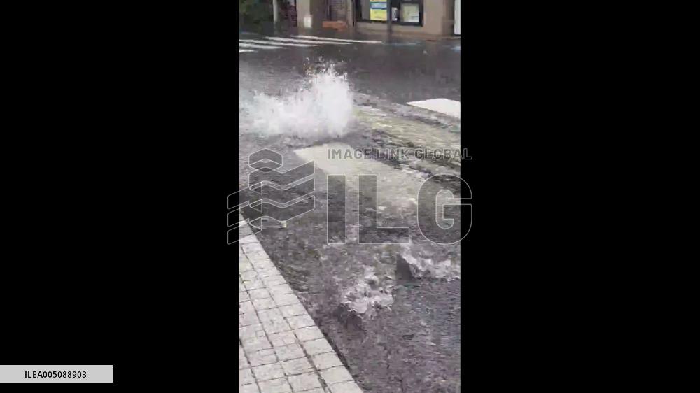 Japan: Tokyo Storm Causes Water to Surge From Manholes