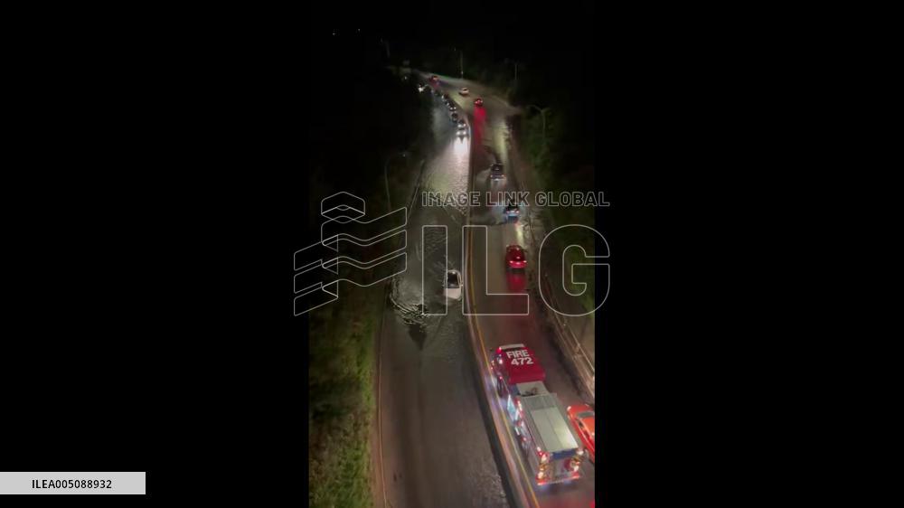 Canada: Car Stuck in Floodwater After Storm Hits Edmonton