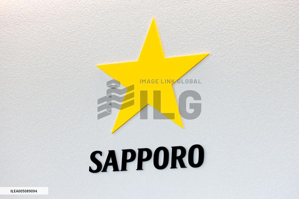 Sapporo Breweries sign and logo