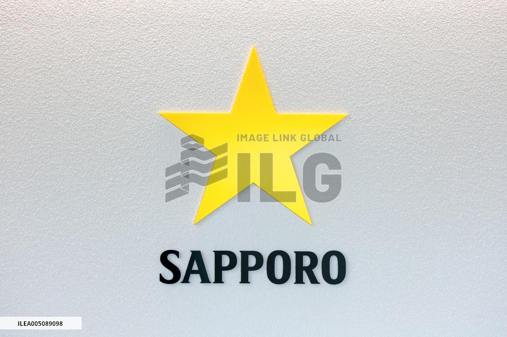 Sapporo Breweries sign and logo