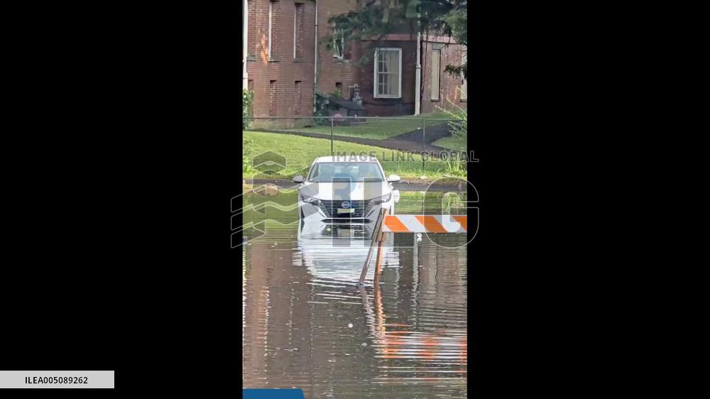 US: Vehicle Submerged in Floodwater in Spring Valley, New York