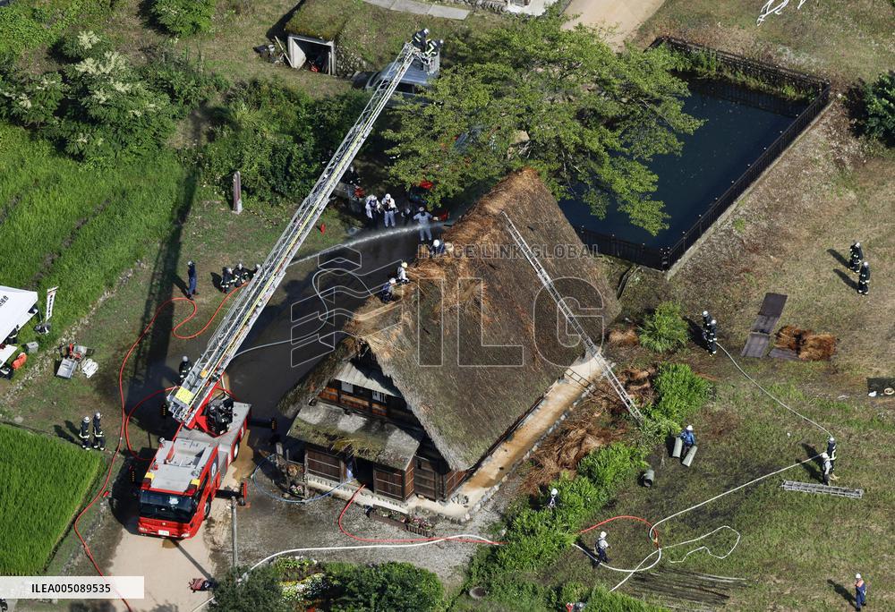 Thatched-roof house catches fire in World Heritage-listed village