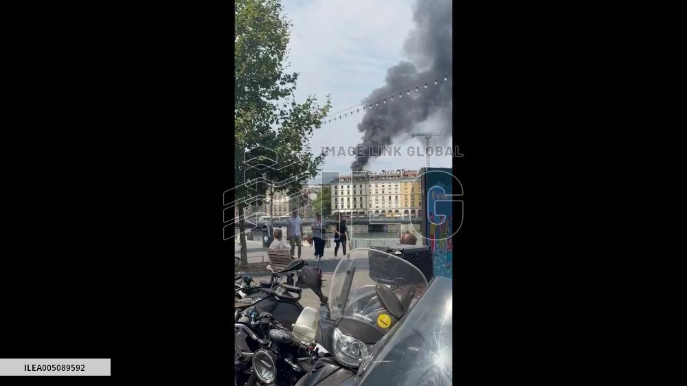 Switzerland: Rooftop Fire Erupts in Central Geneva