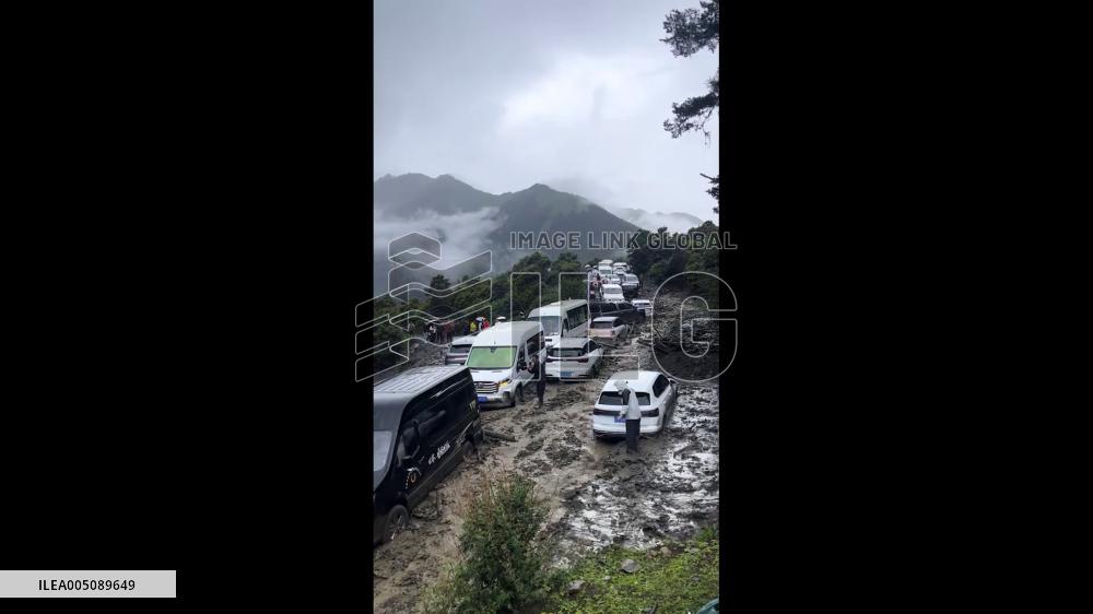 China: Mudslide Blocks Mountain Road in Yunnan, Stranding Vehicles
