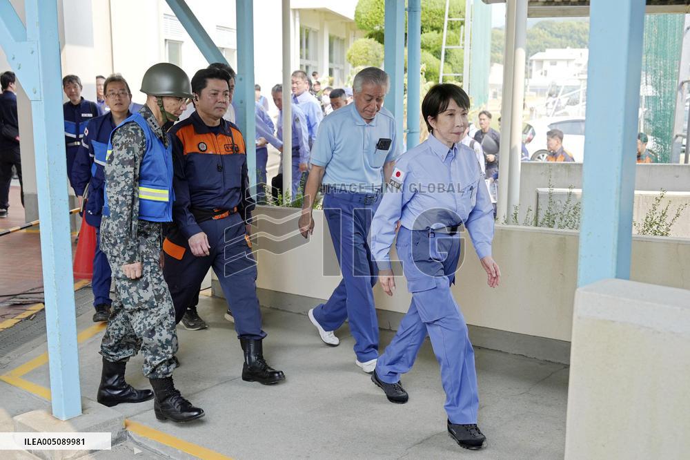 Japan PM Takaichi visits quake-hit Kumamoto
