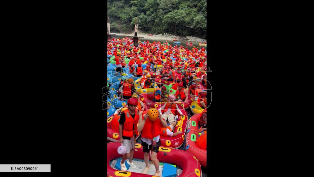 China: River Packed With Boats at Qinling Rafting Attraction