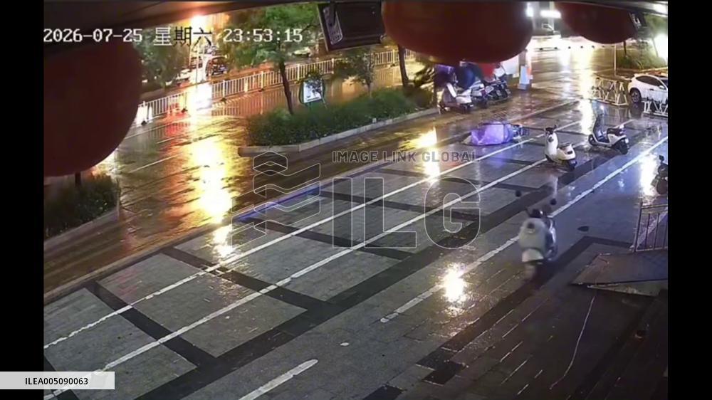 China: Electric Scooter Suspended by Strong Winds as Typhoon Noul Hits Guangdong