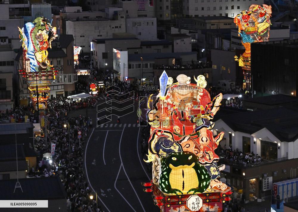 Doll-like lantern parade in northeastern Japan