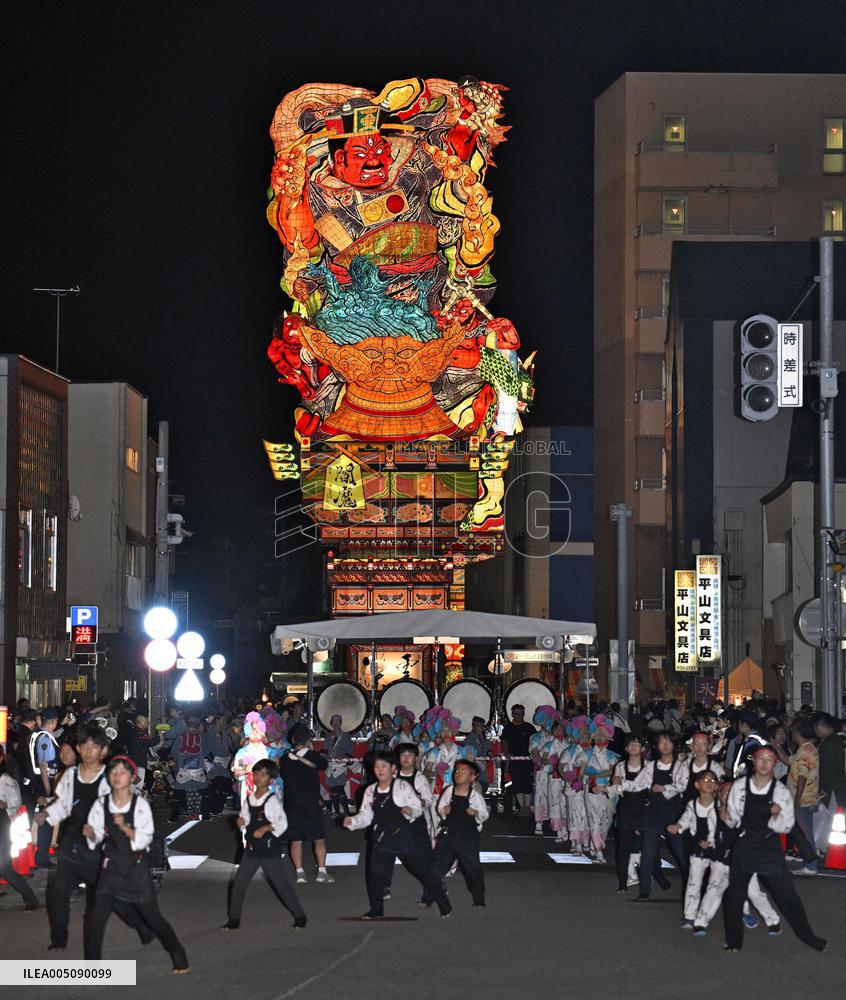 Doll-like lantern parade in northeastern Japan