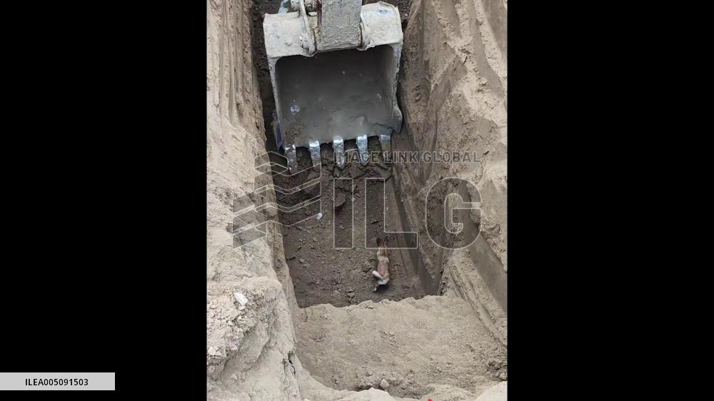 China: Construction Workers Use Excavator to Rescue Trapped Dog