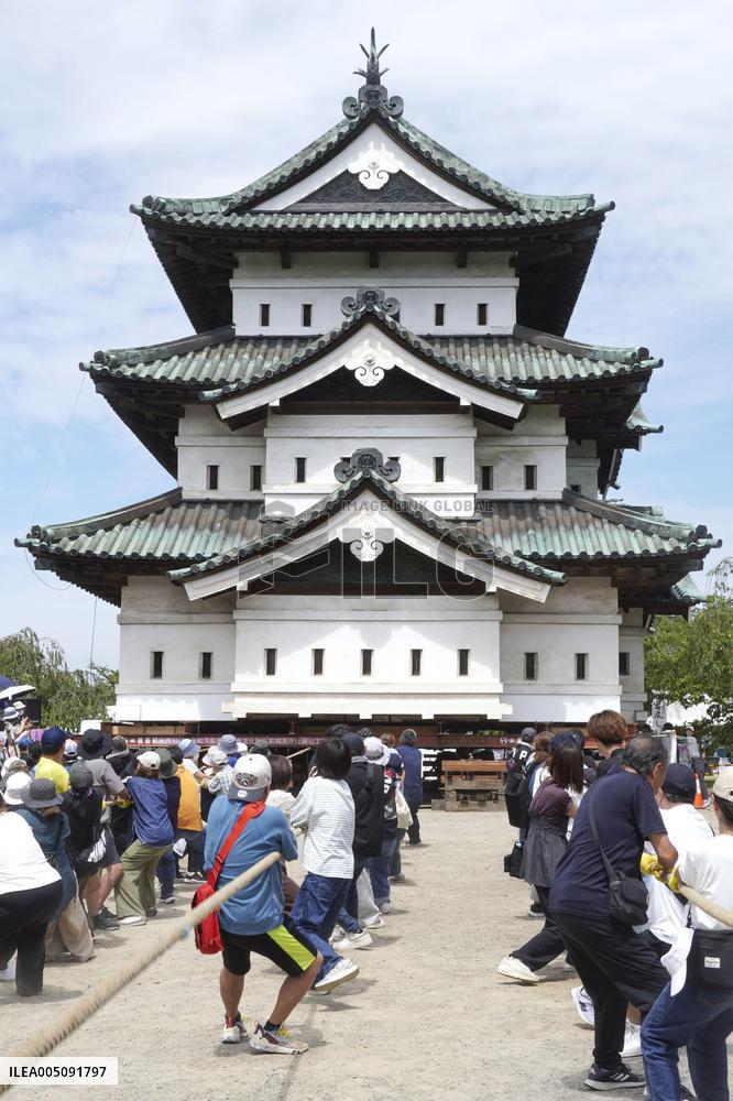 Hirosaki Castle keep moved to original location