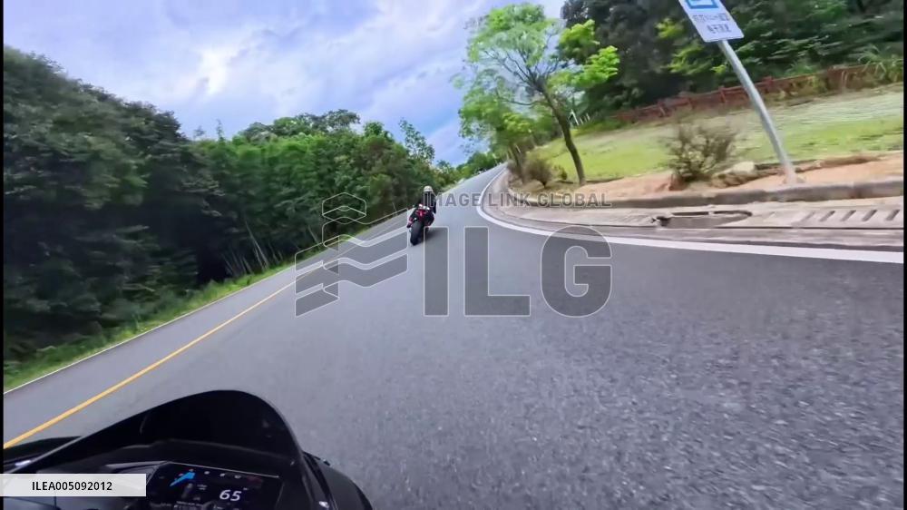 China: Rider Thrown as Motorcycle Pitches Forward on Winding Road