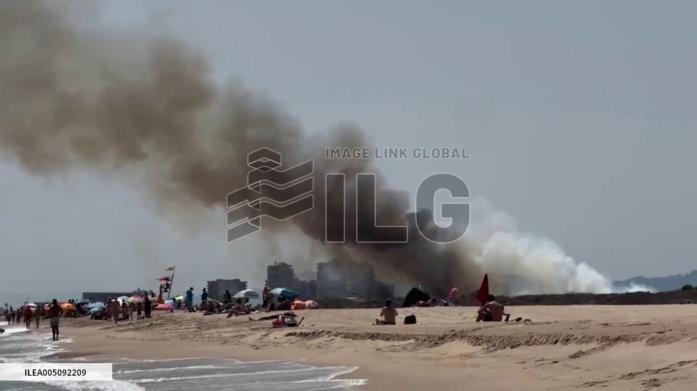 Spain: Wildfire Forces Evacuation of El Saler Village, Valencia
