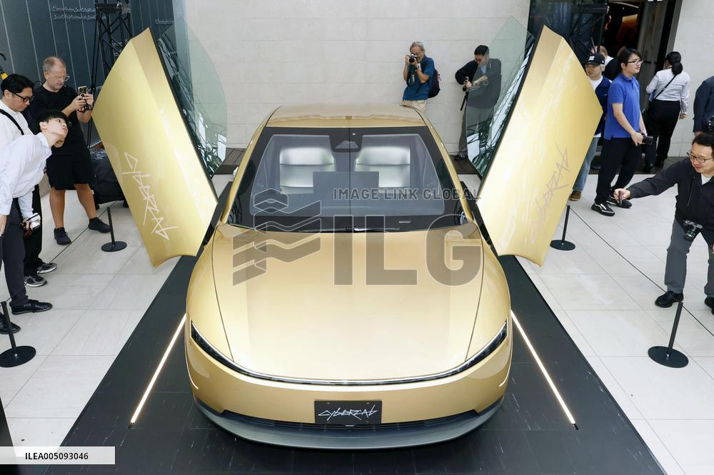 CORRECTED: Tesla unveils driverless Cybercab in Japan