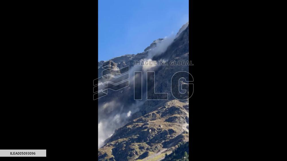 Italy: Rockfall Sends Boulders Crashing Down Alpine Mountainside