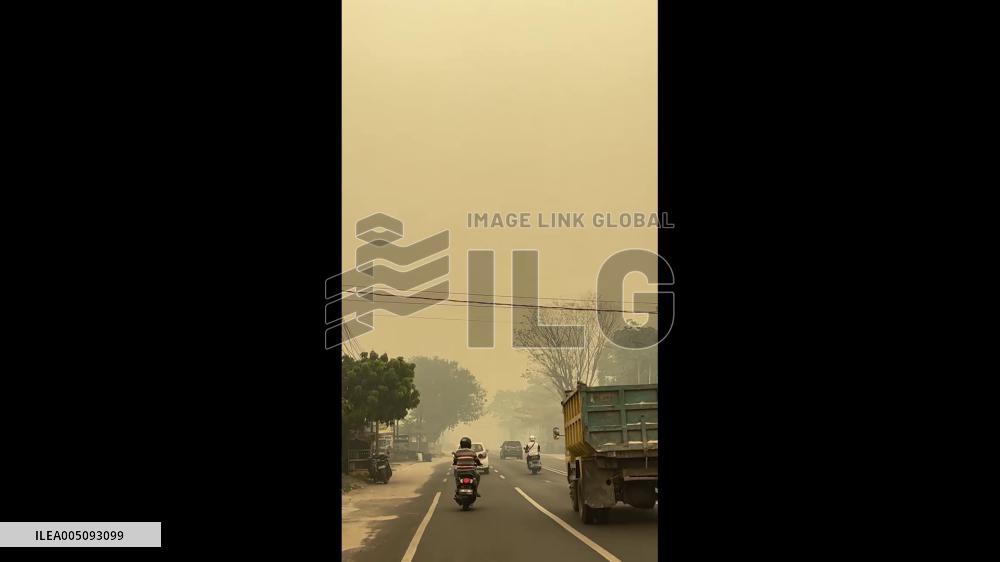 Indonesia: Thick Haze Blankets Road in Palangka Raya