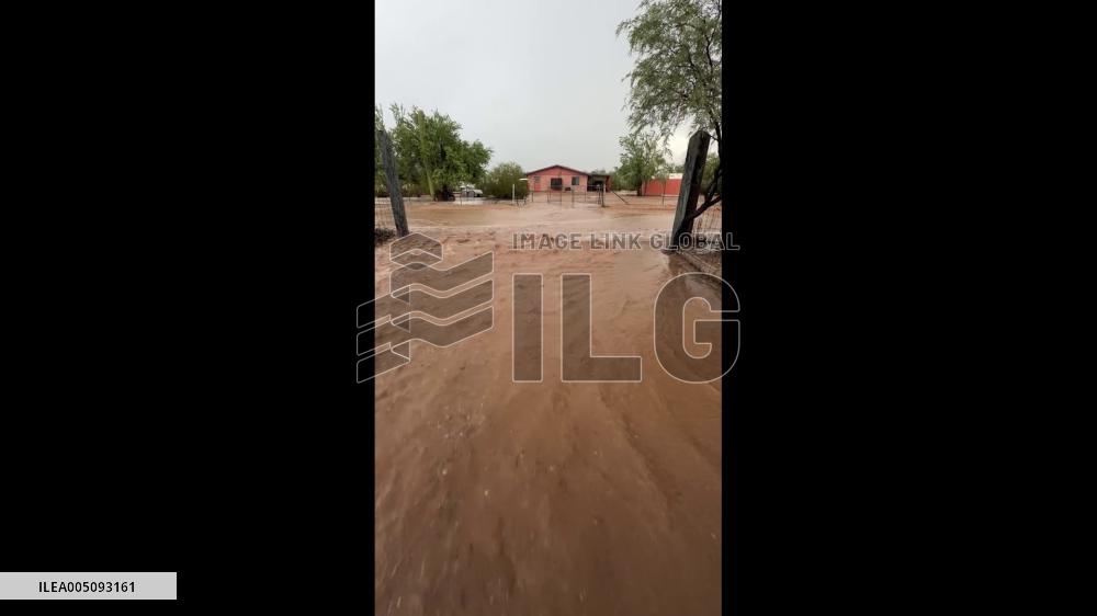 US: Flash Flooding Turns Driveway Into Raging River Amid Arizona Storms
