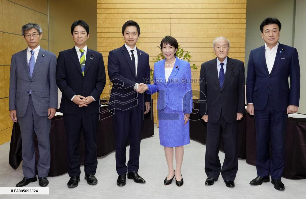 Japan ruling camp talk