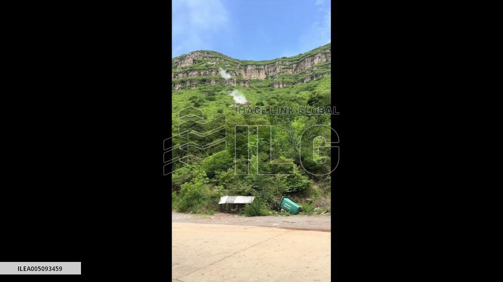 China: Massive Boulder Crashes into Pavilion at Tangshan Scenic Spot