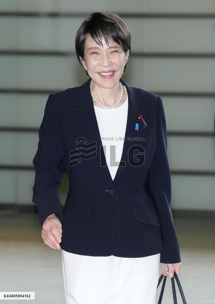 Japan PM Takaichi returns home